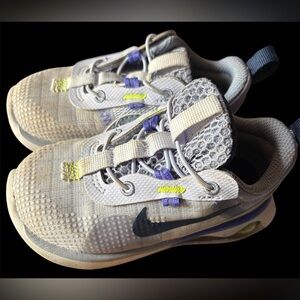 Nike Kids White and Purple Athletic Sneakers with Neon Yellow Accents